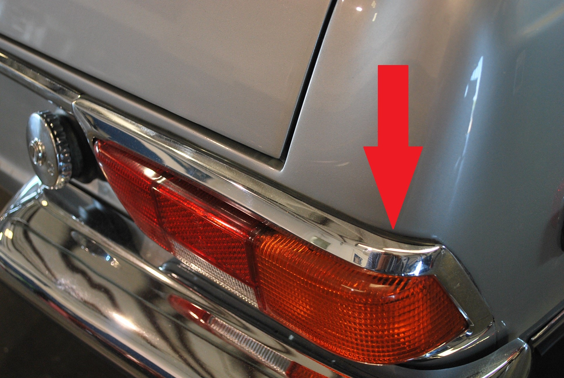 O240-033 - Taillight Chrome bezel lip underlay